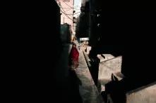 Women standing in an alleay Pakistan
