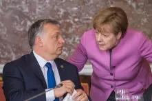 Viktor Orbán in conversation with Angela Merkel