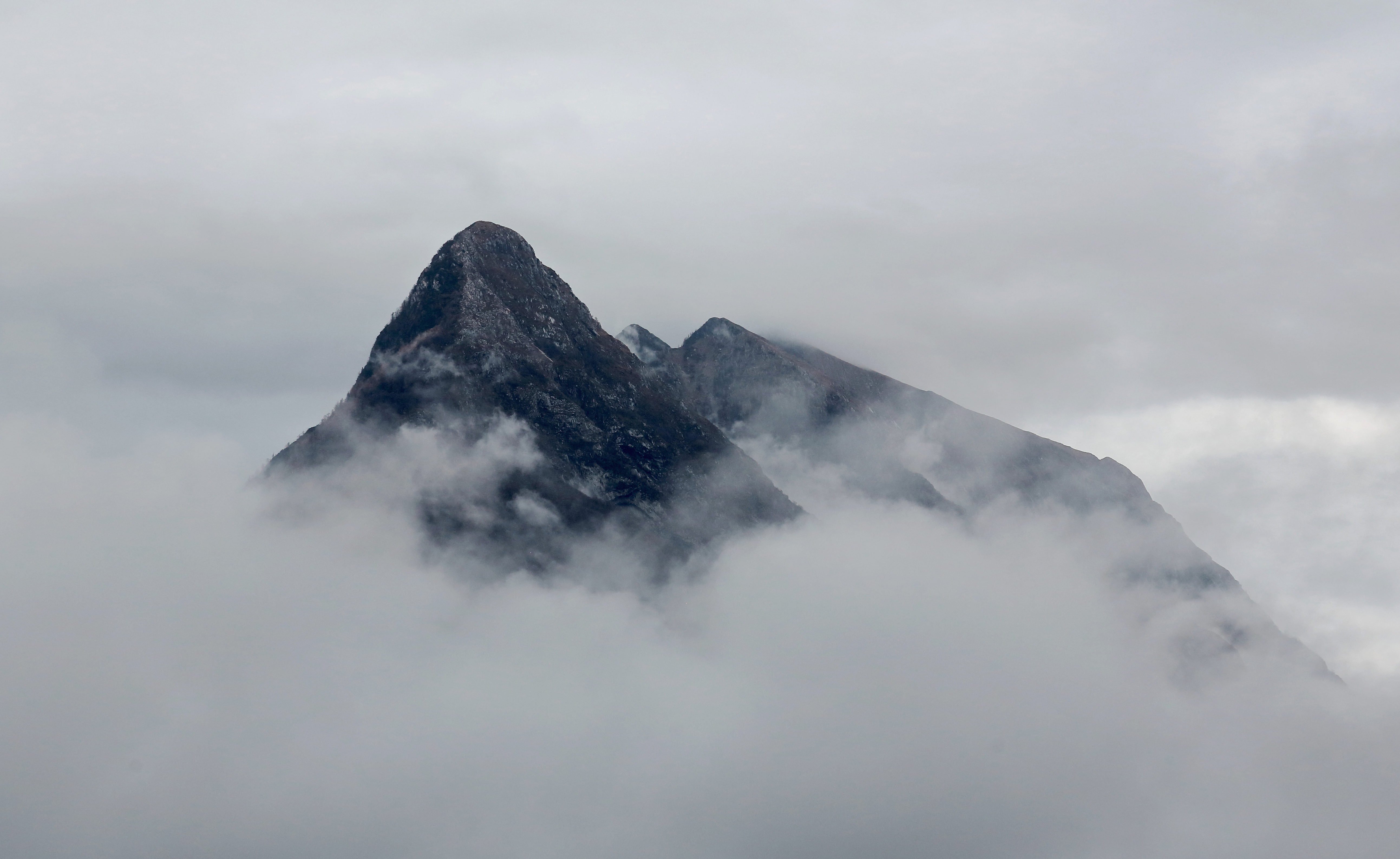 Climate Action Summit's pledges don’t square with what the science is telling us. Pledges that don't square - cloudy mountaintop