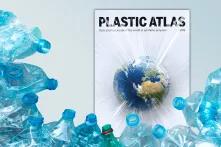 Cover Plastic Atlas with plastic bottles in front