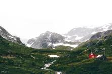 Mountains with grass and snow in Norway