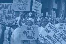 Women in Libia demonstrating with banners