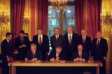 Slobodan Milosevic, Alija Izetbegovic, and Franjo Tudjman sign the Balkan Peace Agreement - Flickr - The Central Intelligence Agency.jpg|Slobodan Milosevic, Alija Izetbegovic, and Franjo Tudjman sign the Balkan Peace Agreement - Flickr - The Central Intelligence Agency