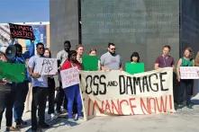 Protest actions at COP27 demanding finance to address loss and damage.