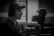 Young man with headphones and mic