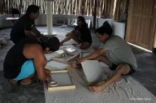 Young people preparing the photo gallery