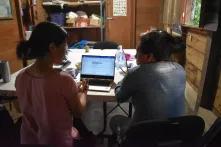 Yolanda Perez in front of computer