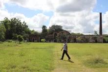 Cristian Sulub on a meadow in front of an old house