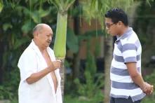 Cristian Sulub talking to another man