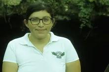 Ha'kanules, activist woman in white poloshirt
