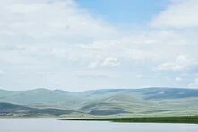 Clouds over lake Arpi in Armenia