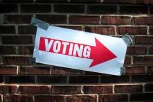 "voting" sign points to polling station