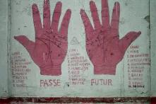 Street Art in Brussels showing the lifelines of two hands