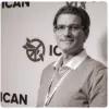 Bild von Jean-Marie Collin, dahinter das Logo von ICAN