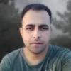 Portrait of Kaustubh Deka. He is looking into the camera with a neutral expression.