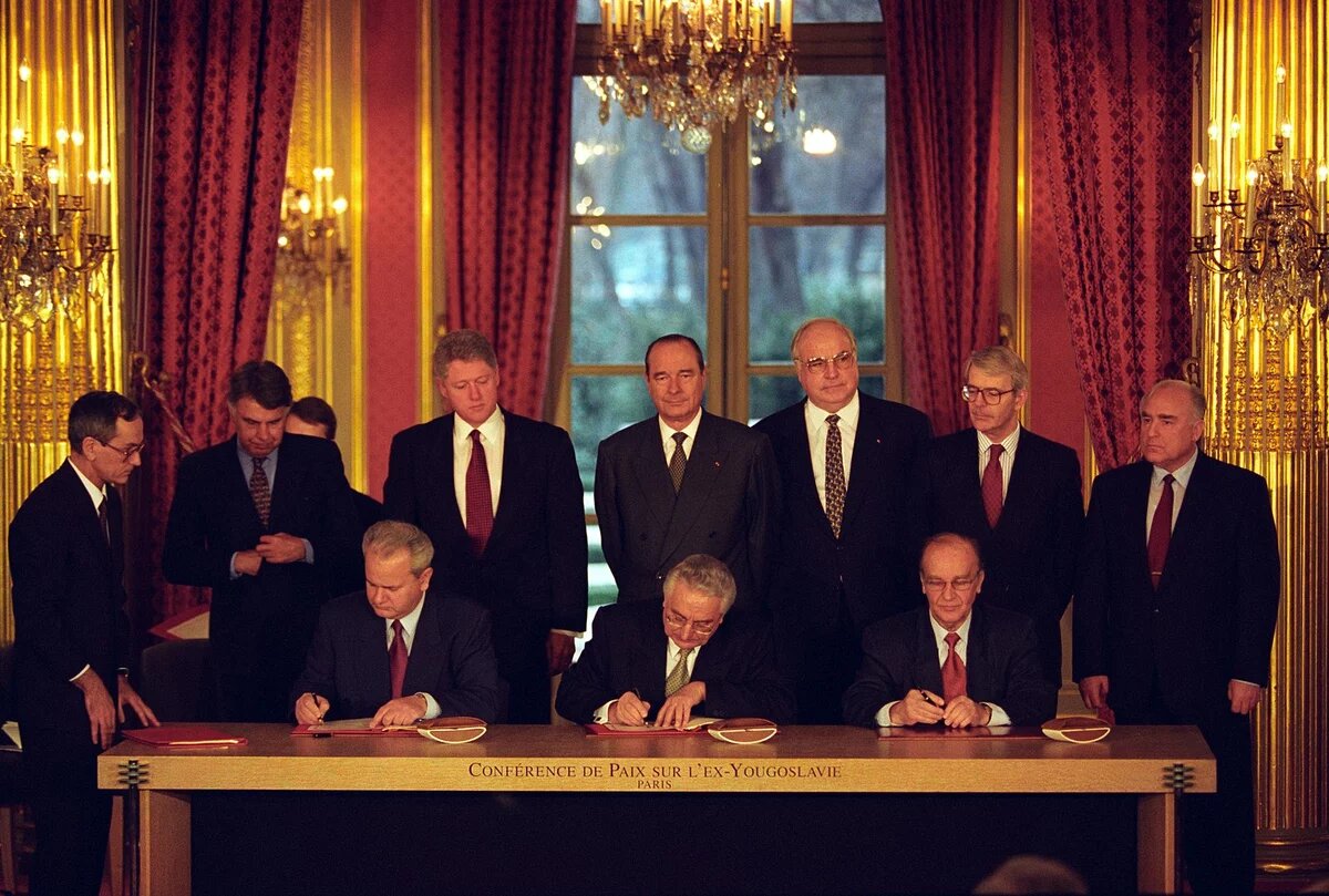 December 14, 1995: Serbian President Slobodan Milosevic, Bosnian President Alija Izetbegovic, and Croatia President Franjo Tudjman sign the Balkan Peace Agreement at the Quai d’Orsay (Foreign Ministry) in Paris. (Credit: William J. Clinton Presidential Library) Hosted by the Clinton Library and the Clinton Foundation, the document release was spearheaded by CIA’s Historical Review Program (HRP), which identifies, collects and produces historically relevant collections of declassified materials. The Bosnia collection—the youngest ever released in HRP’s 20-year existence—is available online at www.cia.gov/library/publications/historical-collection-pu... A video recording of the symposium is available at www.clintonpresidentialcenter.org Slobodan Milosevic, Alija Izetbegovic, and Franjo Tudjman sign the Balkan Peace Agreement - Flickr - The Central Intelligence Agency.jpg|Slobodan Milosevic, Alija Izetbegovic, and Franjo Tudjman sign the Balkan Peace Agreement - Flickr - The Central Intelligence Agency