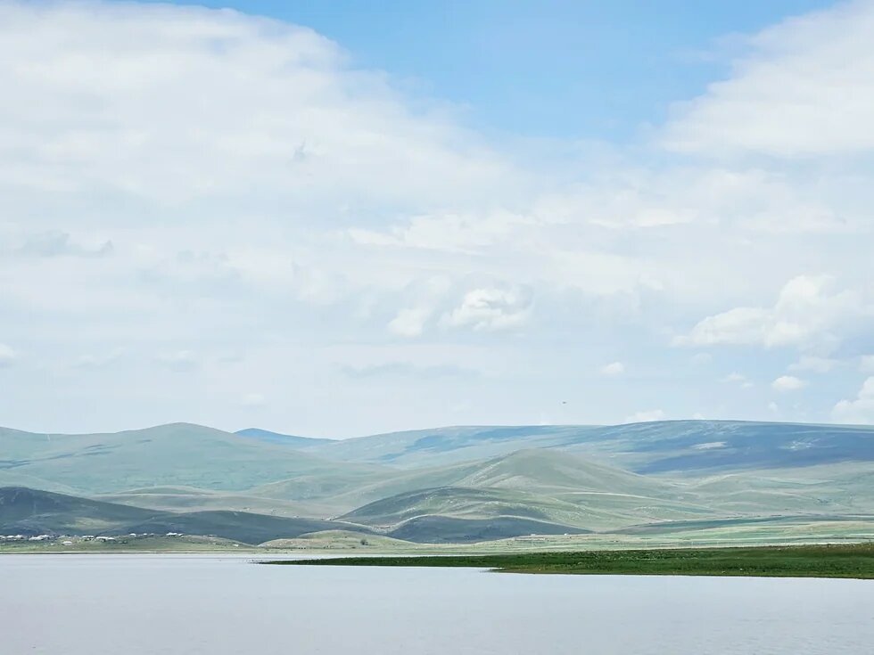 Clouds over lake Arpi in Armenia