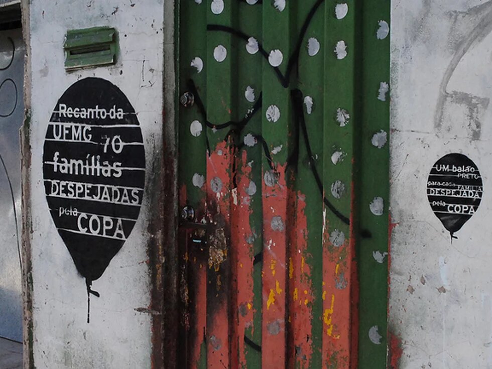 Remoções em Belo Horizonte Graffitti on a house in Belo Horizonte displaying how many families lost their homes due to construction projects for the World Cup