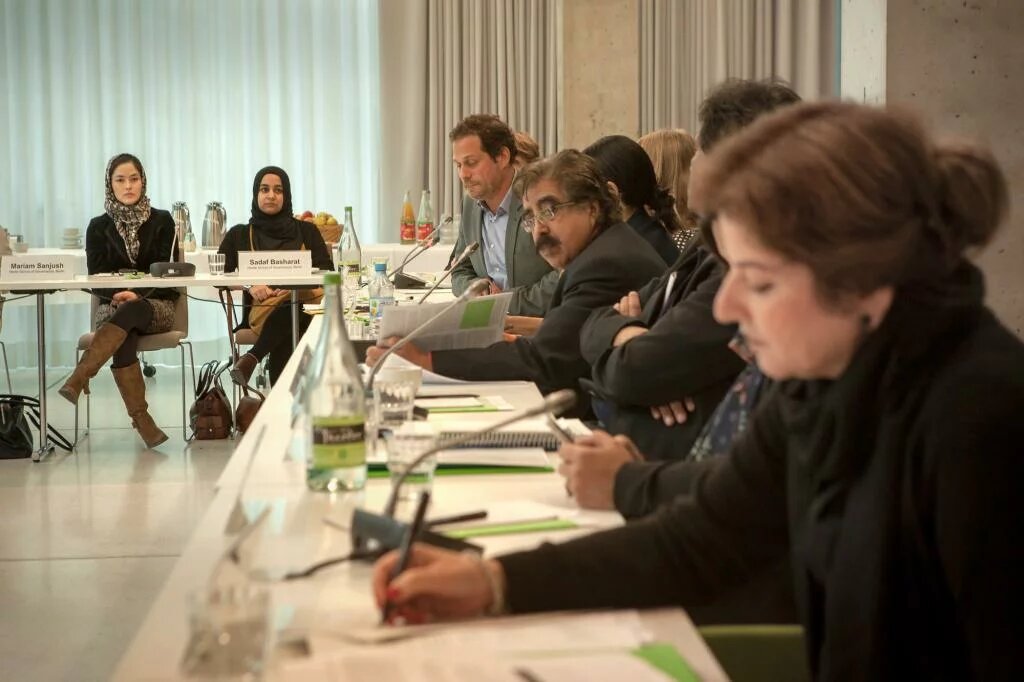 The delegation disusses the key findings of the study.