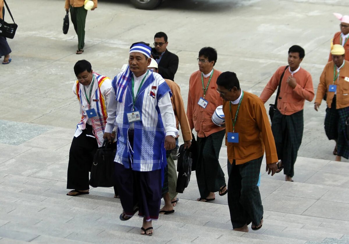A member of parliament from ethnic party and NLD party members are attending to the lower house parliament in Naypyitaw on 2nd Day of parliament A member of parliament from ethnic party and NLD party members are attending to the lower house parliament in Naypyitaw on 2nd Day of parliament