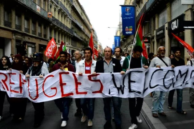 Whilst the French government focuses on military actions in dealing with the refugee crisis, these protestants in Toulouse demand more help for the refugees (September 5, 2015) Whilst the French government focuses on military actions in dealing with the refugee crisis, these protestants in Toulouse demand more help for the refugees (September 5, 2015)