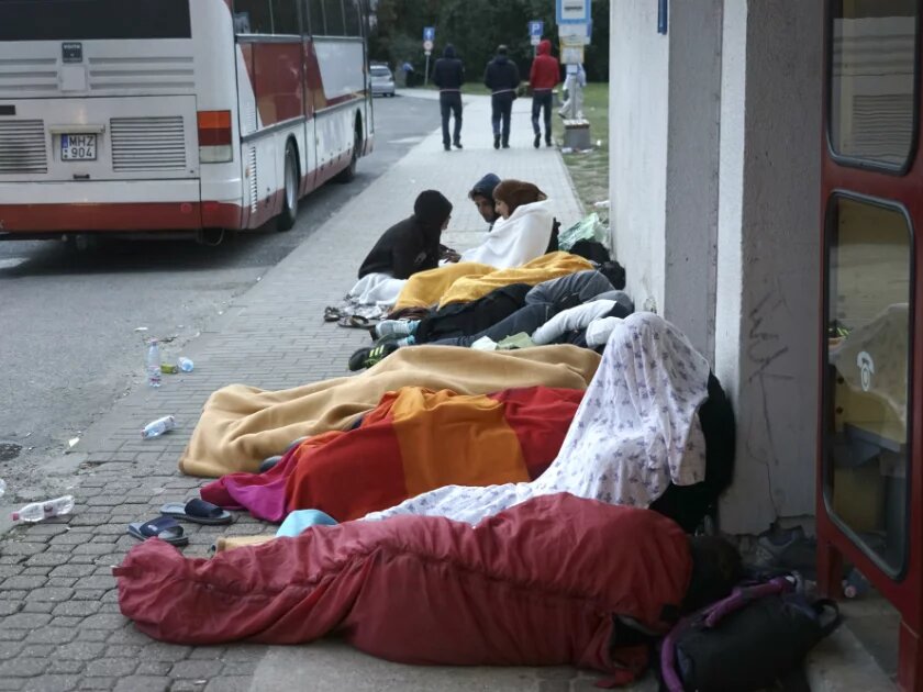 Syrian refugees sleeping in the open air during refugee crisis. Budapest, Hungary, Central Europe, 4 September 2015 Syrian refugees sleeping in the open air during refugee crisis. Budapest, Hungary, Central Europe, 4 September 2015