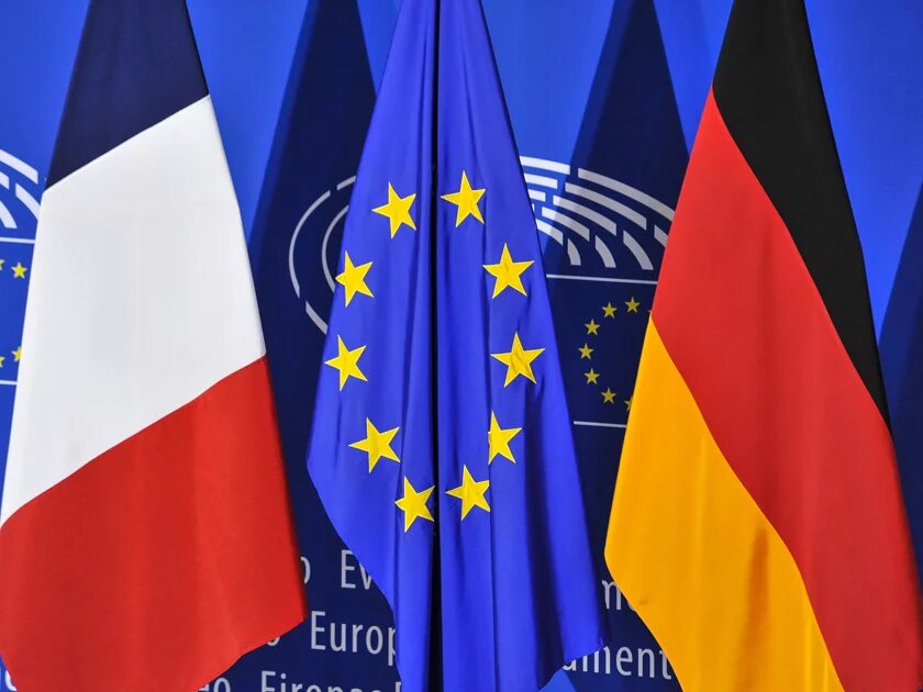 Flags in front of backdrop