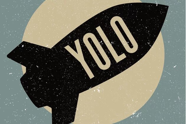 YOLO - You Only Launch Once YOLO written on an atomic bomb
