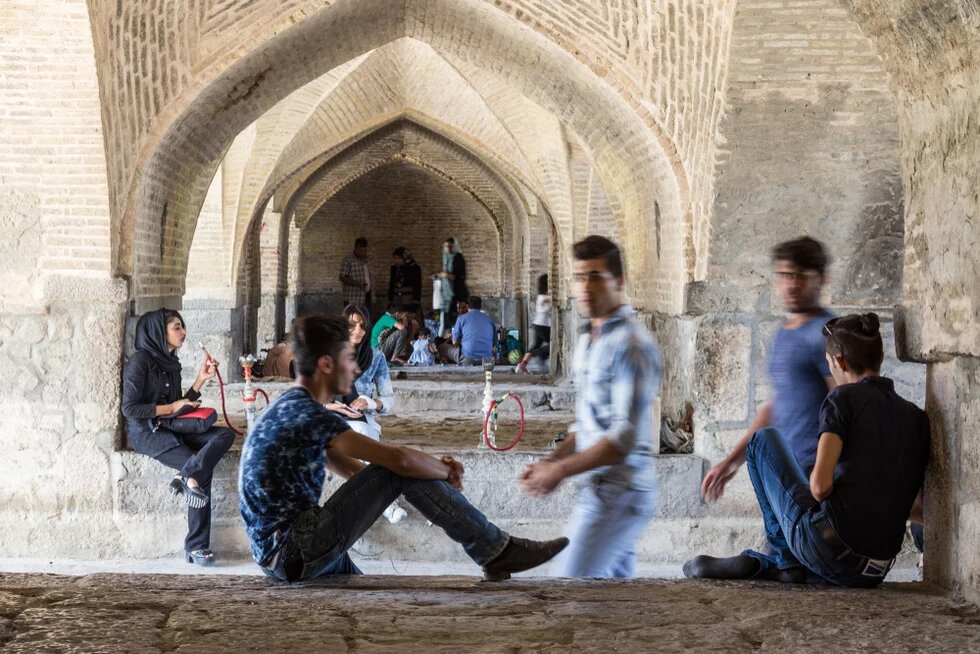 Isfahan, Iran 2016: Iranian Youngsters gathering under Si o Seh Pol Bridge Iranian Youngsters gathering under Si o Seh Pol Bridge