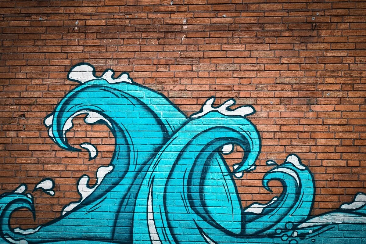 Serbien und Kosovo – zwei unvollendete Staaten Serbien und Kosovo – Bild: Street Art - zwei Wellen schlagen ineinander.
