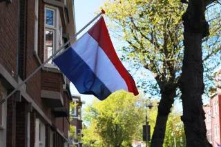 The Dutch Flag on Koningsdag Flagge der Niederlande an eienm Haus