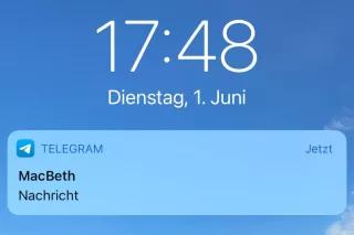 Ausschnitt eines Smartphone-Startbildschirms mit einer Telegramnachricht von "MacBeth"