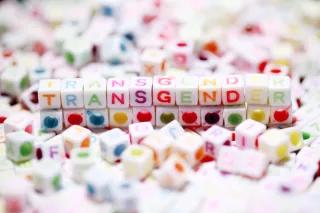Cubes with letters spelling the word "transgender"