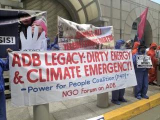 NGO Forum Protest at ADB02. Plakat: ADB Lrgacy: Dirty Energy & Climate Emergency!