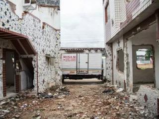 Urban demolition works in the streets of Recife paving the ground for the construction of a new stadium and a real estate mega-project "World Cup Village"