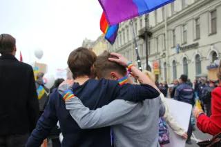 Two girls hug eachother during the pride 2014 in St. Petersburg