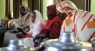 Sudan’s Civil Society - Awadia Kuku Sudan’s Civil Society - Awadia Kuku with the ladies from the Women's Cooperative Union