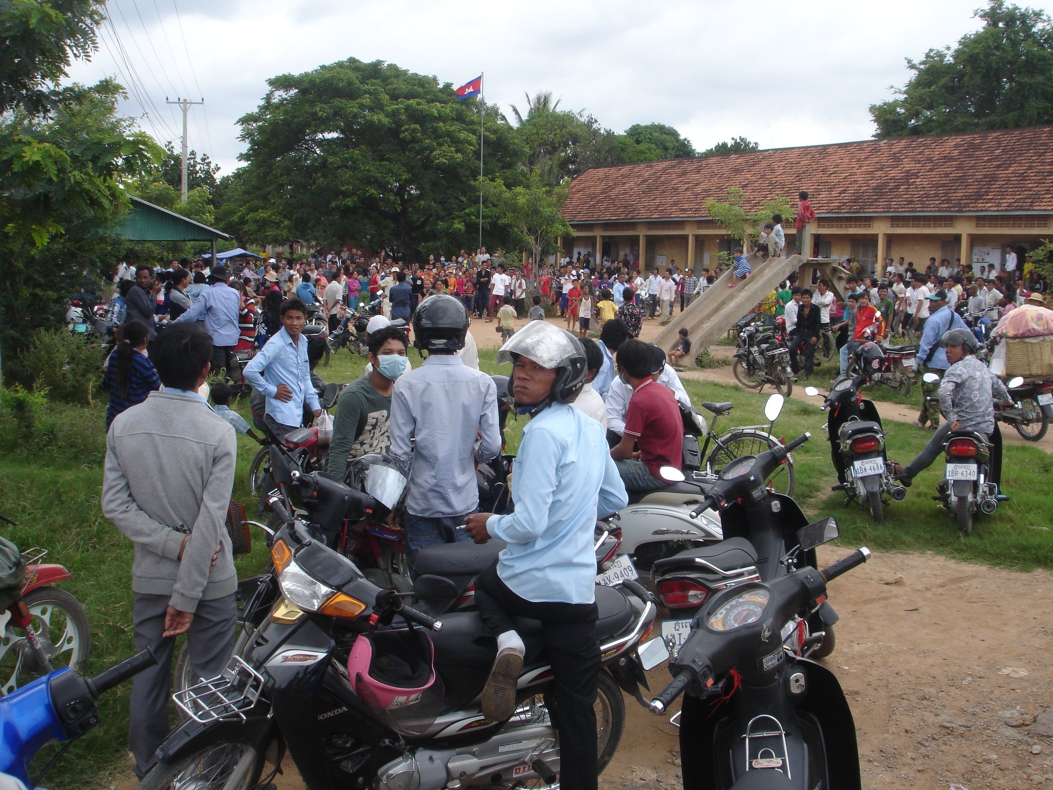 People gather in front of polling station 1204. They are protesting against alleged voter fraud.