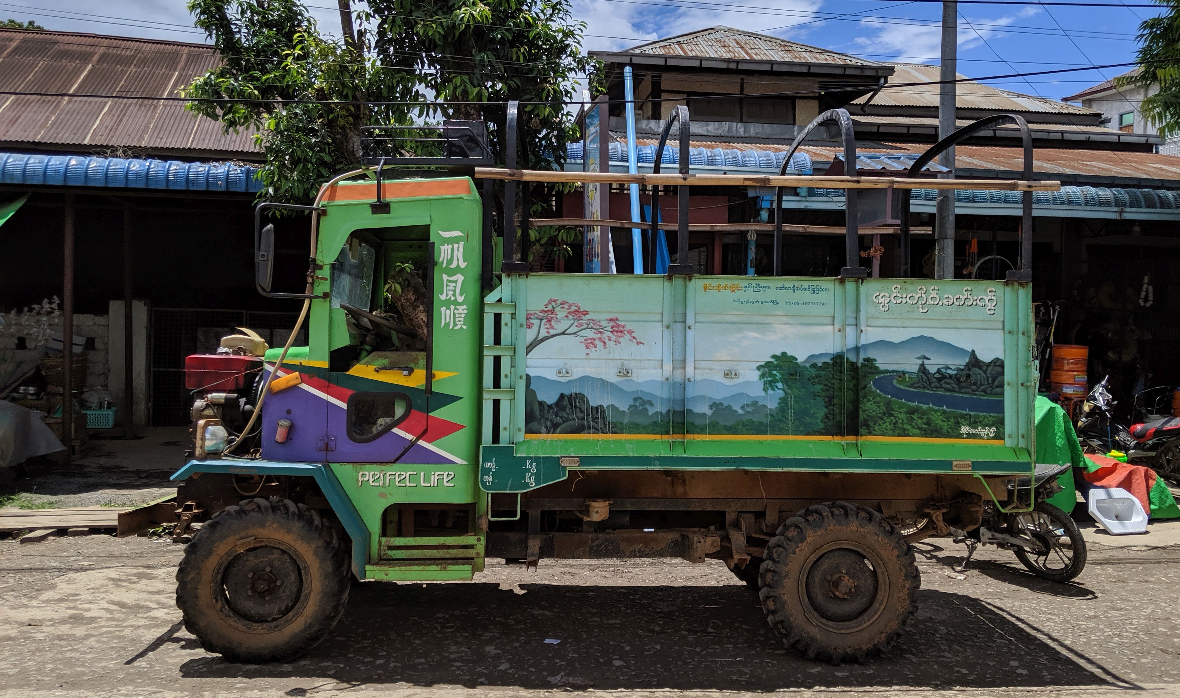 "Smooth Sailing" (一帆风顺) on the Myanmar-China Road. Seen in Hseni, Northern Shan State, Myanmar, 19.06 2019. Truck on the streets of Myanmar